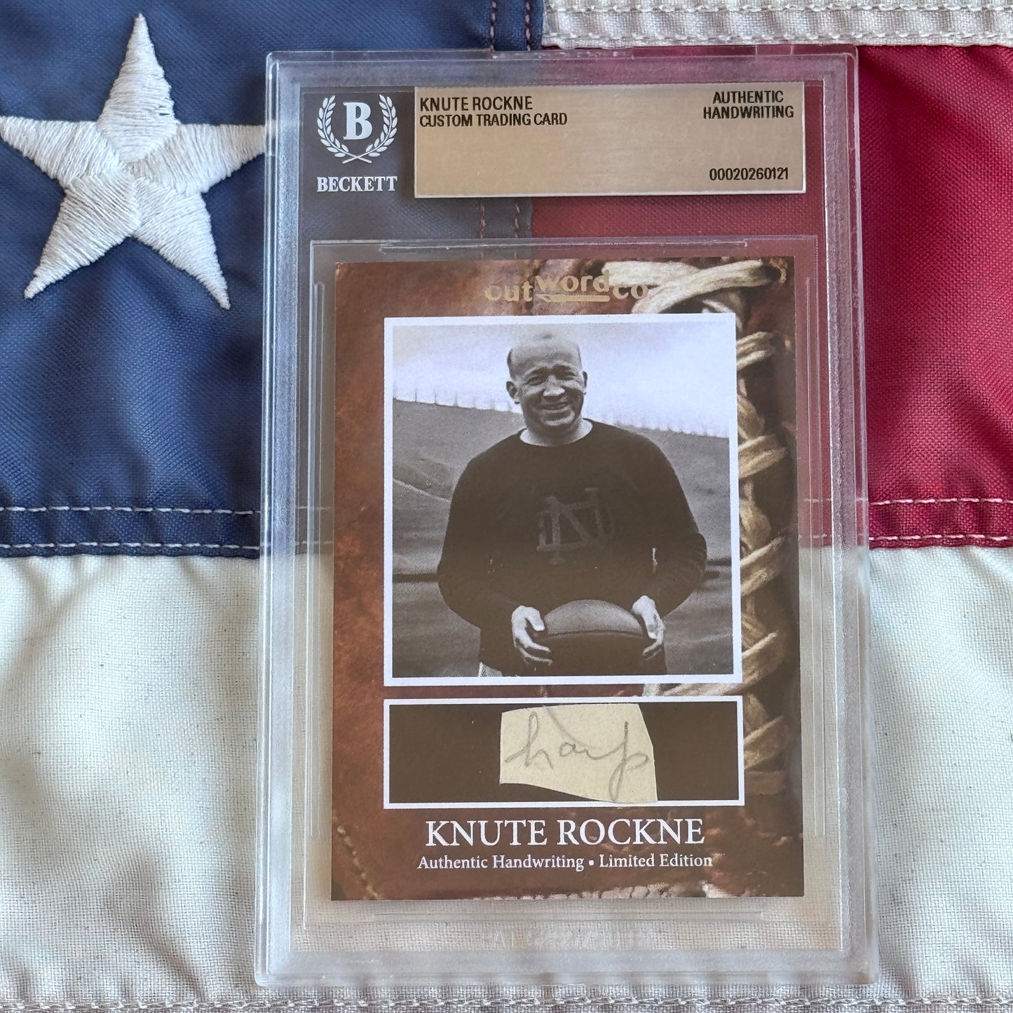 Knute Rockne Beckett Encapsulated Handwriting Removed from his Notre Dame Textbook Signed