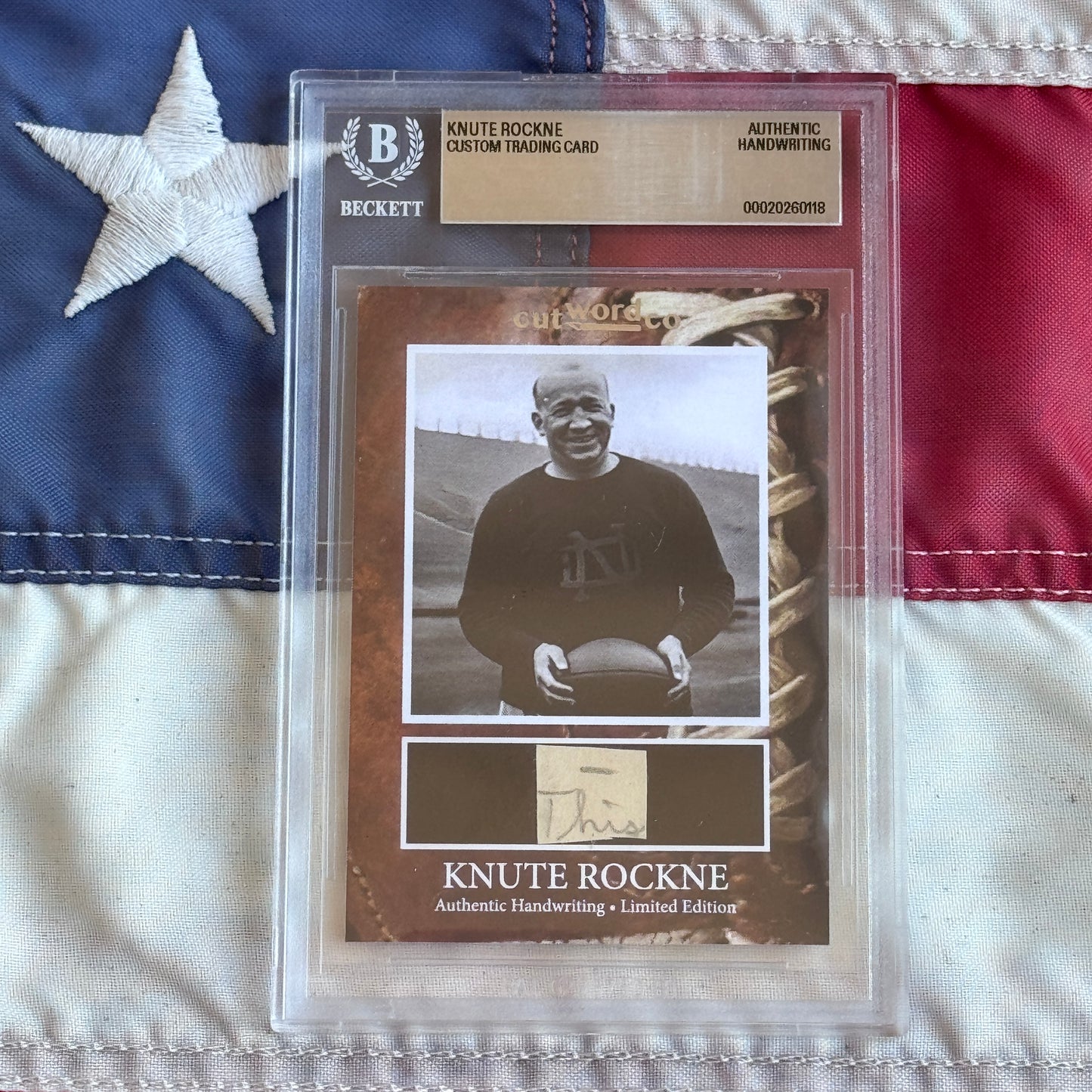Knute Rockne Beckett Encapsulated Handwriting Removed from his Notre Dame Textbook Signed